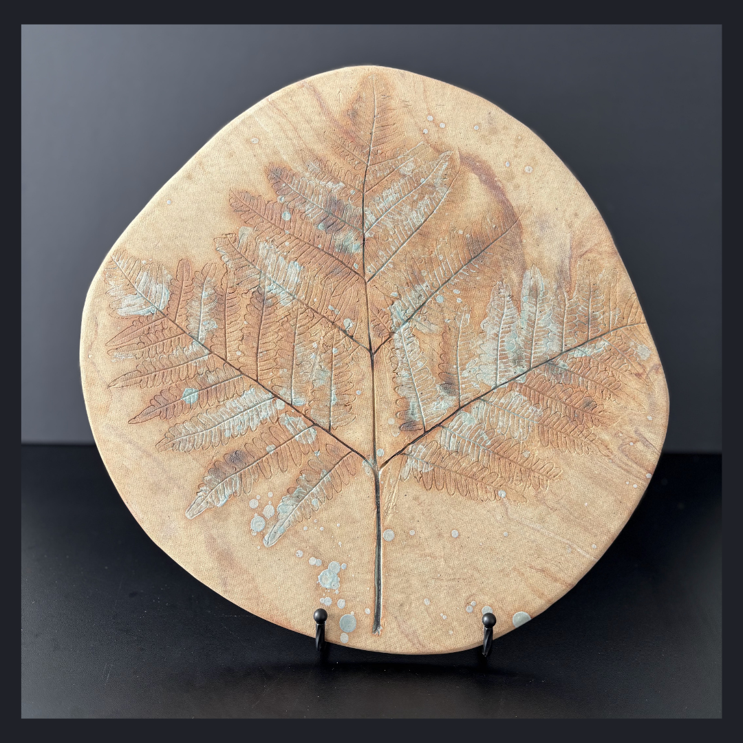 Decorative plaque with fern impressions