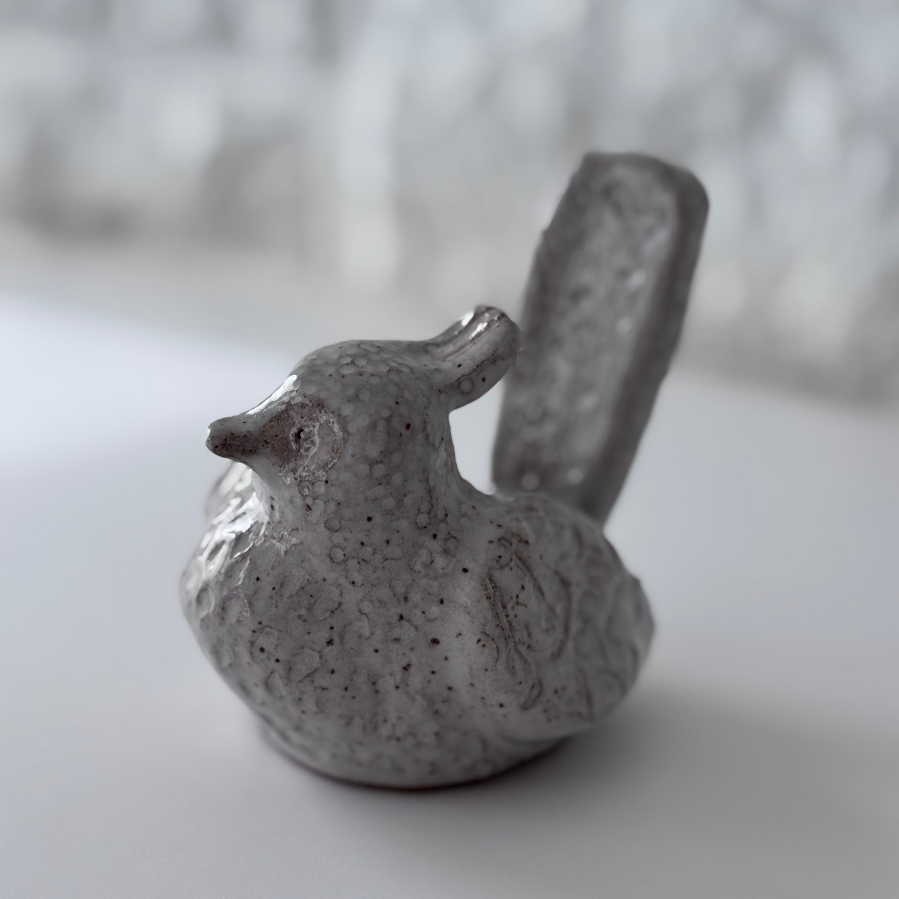 Textured speckled bird